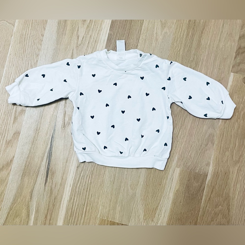 H&M Organic White Sweatshirt with Black Heart Pattern